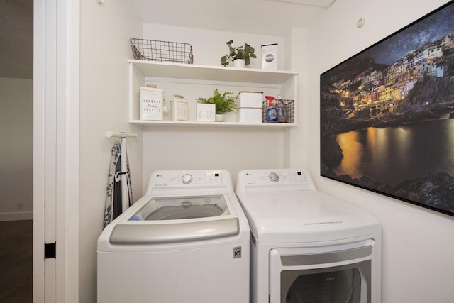 laundry room featuring washing machine and dryer