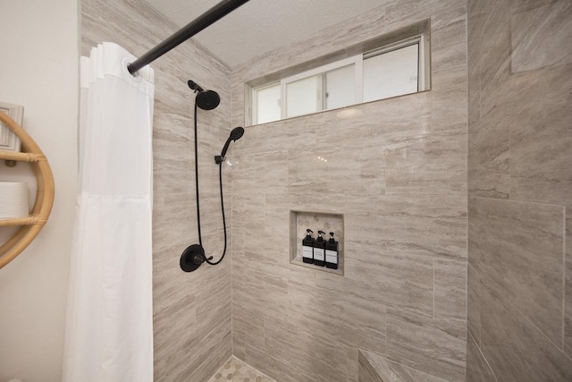 bathroom with a shower with shower curtain