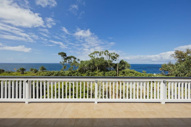 view of patio featuring a water view