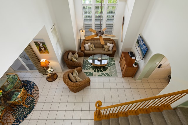 living area featuring tile patterned floors