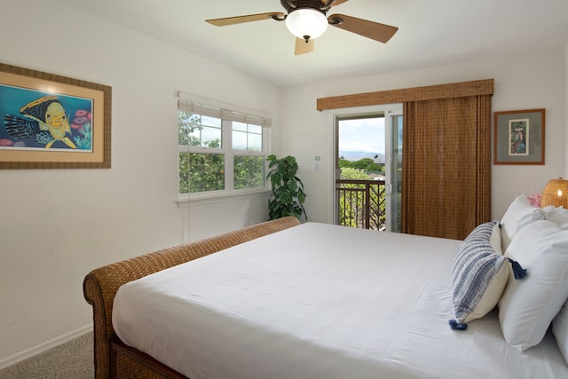 carpeted bedroom featuring access to exterior and ceiling fan