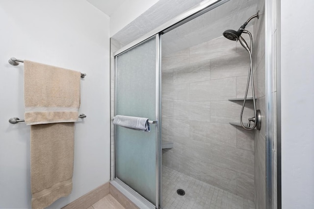 bathroom with an enclosed shower