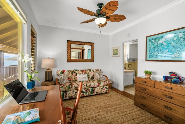 tiled living room featuring crown molding and ceiling fan