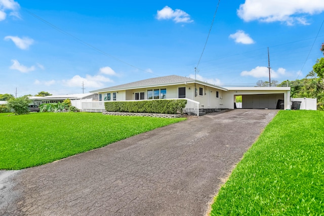 single story home with a carport and a front yard