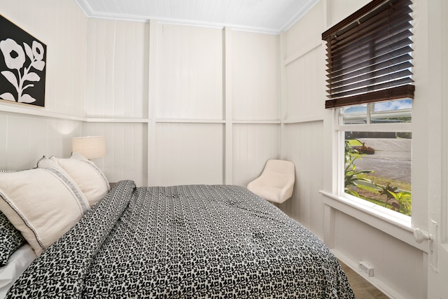 bedroom featuring crown molding