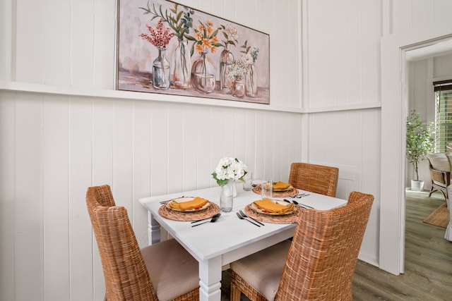 dining room with hardwood / wood-style floors