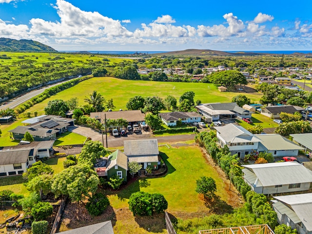 birds eye view of property featuring a mountain view