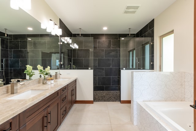 bathroom featuring tile patterned flooring, tile walls, separate shower and tub, and vanity