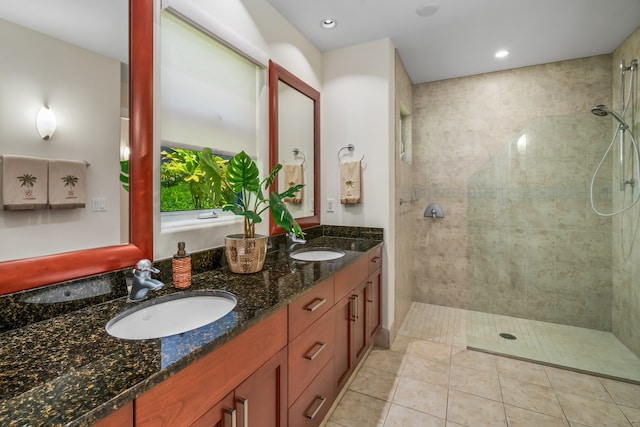 bathroom with independent shower and bath, tile patterned flooring, and double sink vanity