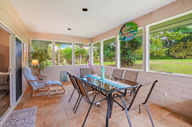 sunroom / solarium featuring a wealth of natural light