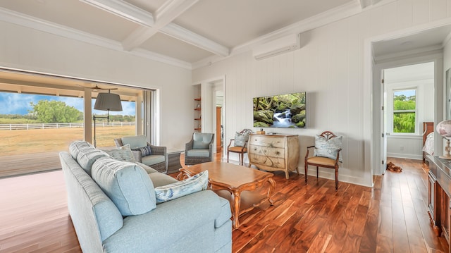 living area featuring beam ceiling, a wall unit AC, crown molding, wood finished floors, and coffered ceiling