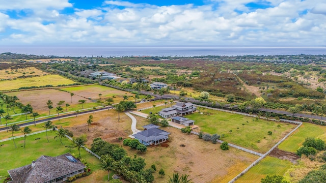 drone / aerial view with a water view and a rural view