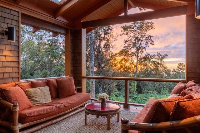 interior space featuring vaulted ceiling with beams and wood ceiling