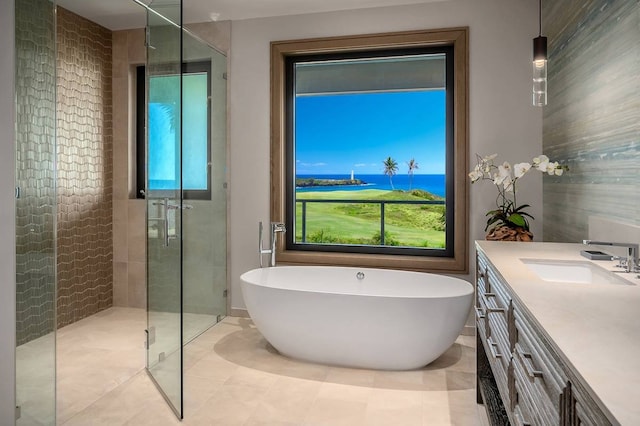 bathroom with vanity, shower with separate bathtub, and tile patterned flooring