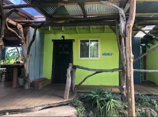 entrance to property with a wooden deck