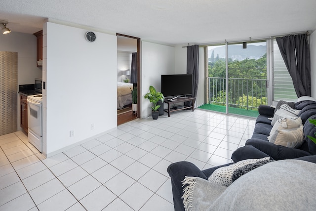 tiled living room with a textured ceiling