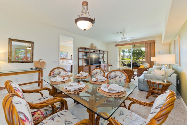 dining room featuring ceiling fan