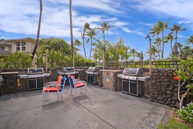 view of patio featuring a grill