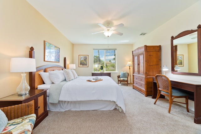 bedroom with ceiling fan and light carpet