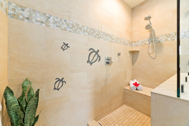 bathroom featuring a tile shower