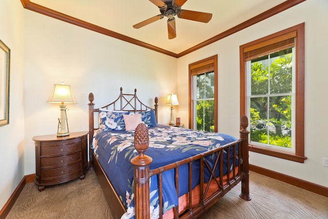 carpeted bedroom with multiple windows, crown molding, and ceiling fan