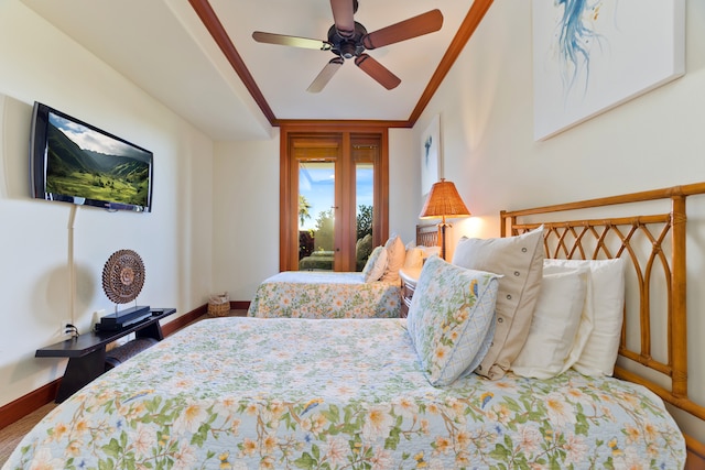 bedroom featuring ceiling fan and ornamental molding