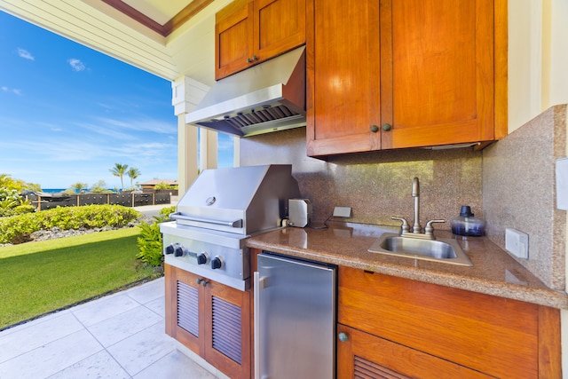 view of patio / terrace featuring sink, exterior kitchen, and area for grilling