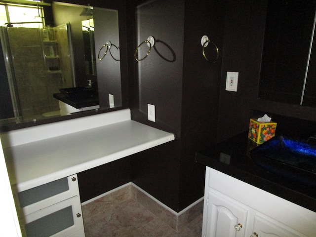 bathroom featuring vanity and tile patterned floors