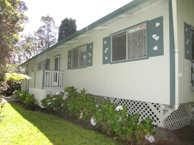 view of property exterior featuring a yard