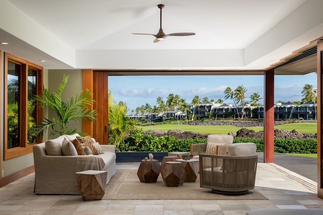 interior space featuring light tile patterned floors and ceiling fan