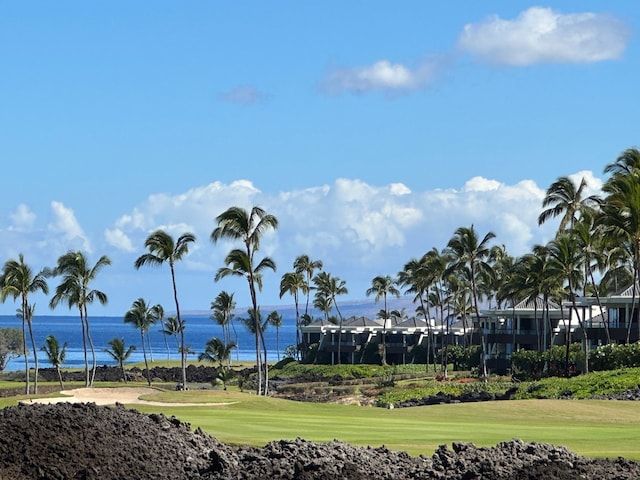 surrounding community featuring a water view