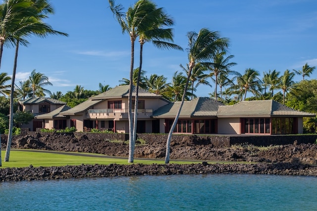 exterior space with a water view