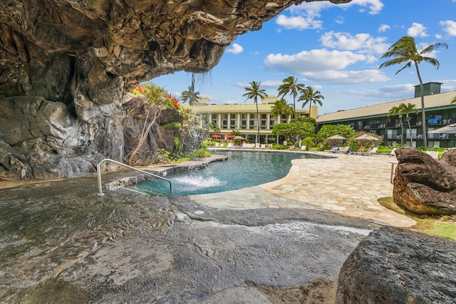 view of swimming pool featuring a patio