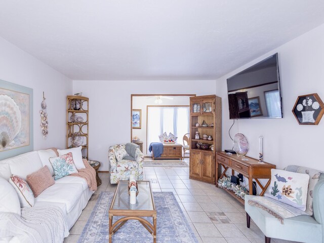 living area featuring light tile patterned floors