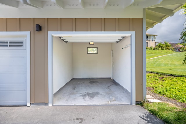 garage with a yard