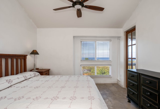 tiled bedroom with ceiling fan