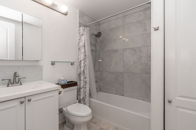 full bathroom with toilet, backsplash, tile patterned flooring, shower / bath combination with curtain, and vanity