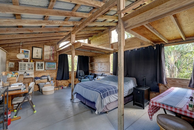 interior space with multiple windows and lofted ceiling