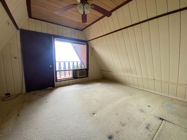 unfurnished room featuring ceiling fan, carpet flooring, vaulted ceiling, and wood ceiling