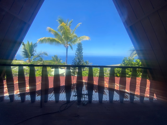 view of swimming pool featuring a water view