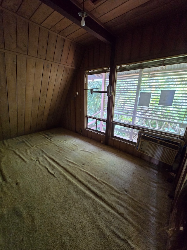 interior space with lofted ceiling with beams and wood ceiling