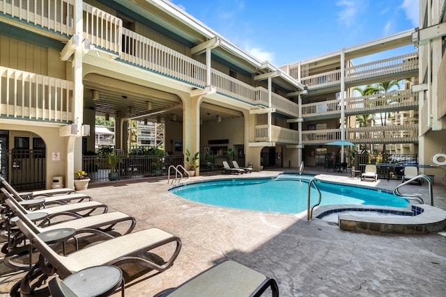 view of pool featuring a patio area