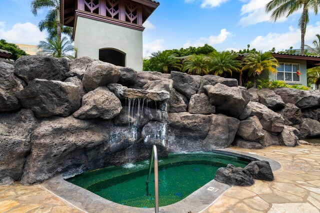 view of swimming pool featuring a patio