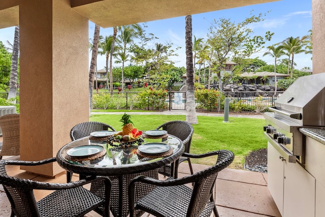 view of patio featuring a grill