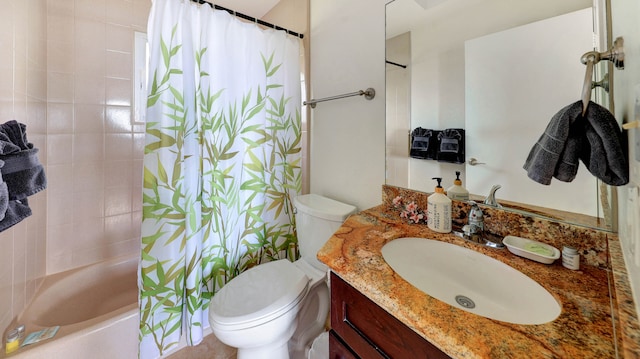 full bathroom with vanity, shower / bathtub combination with curtain, and toilet