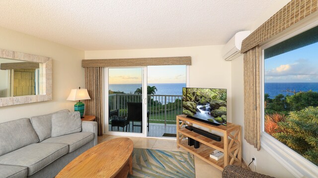 tiled living room featuring a wall mounted air conditioner and a textured ceiling