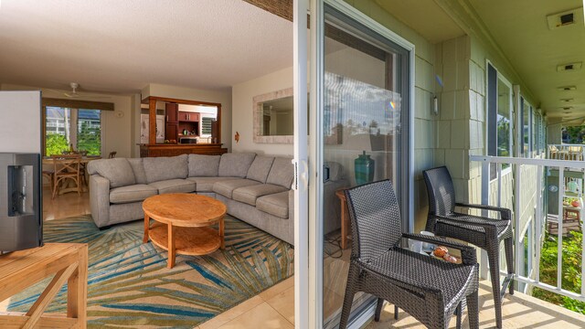 exterior space featuring light tile patterned floors