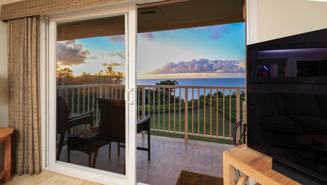 balcony at dusk with a water view