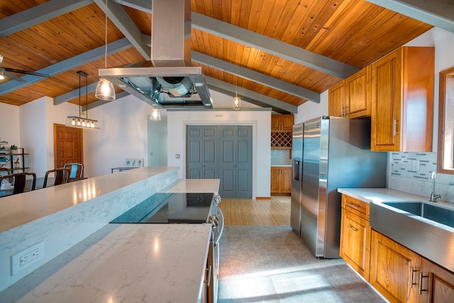 kitchen featuring island range hood, appliances with stainless steel finishes, decorative backsplash, and vaulted ceiling with beams