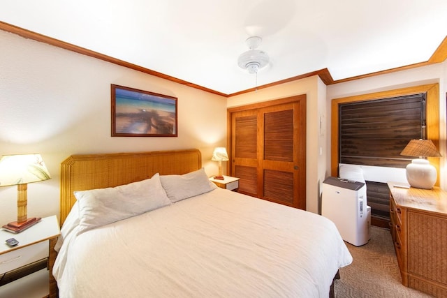 bedroom featuring light carpet, ornamental molding, and a closet